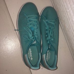 Turquise mesh Stan Smiths.